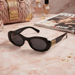 Miu Miu Black Oval Sunglasses with Gold Lettering Logo