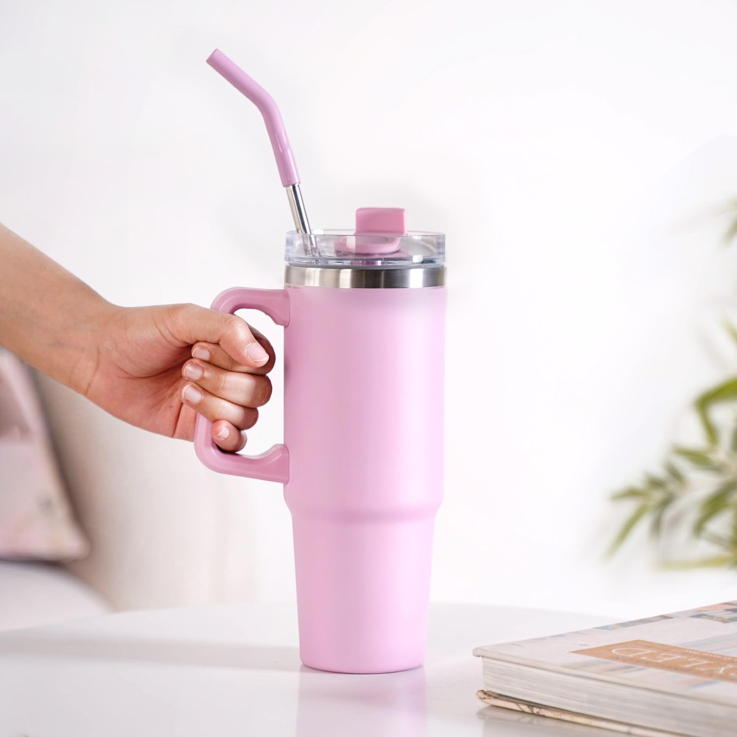 Easy Grip Pink Straw Mug - A stylish hydration solution featuring a soft matte pink finish, ergonomic easy-grip handle, built-in reusable straw, and double-wall insulation for hot and cold beverages.