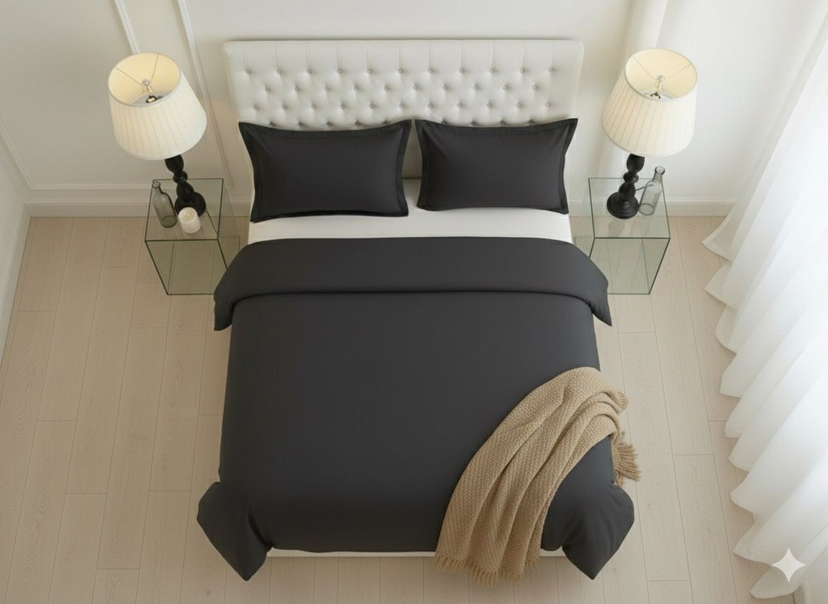 Close-up view of the luxurious fabric of the Luxury 4-Piece Black Microfiber Bedding Set, showcasing its ultra-soft and breathable texture.