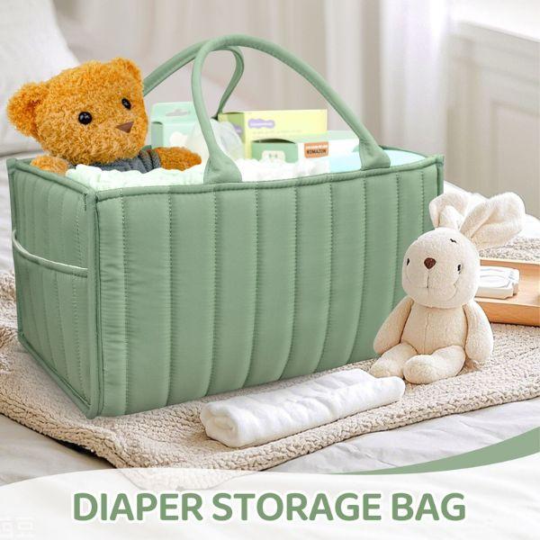Spacious Baby Soft Beige Fabric Organizer Basket featuring reinforced handles for secure carrying, ideal for nursery organization.