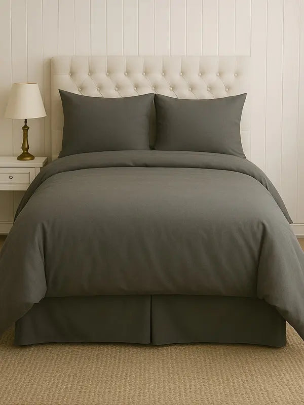 Luxury 4-Piece Charcoal Microfiber Bedding Set displayed on a neatly made bed, showcasing its sophisticated style and comfort.