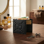 Gucci GG Embossed Black Leather Bifold Wallet