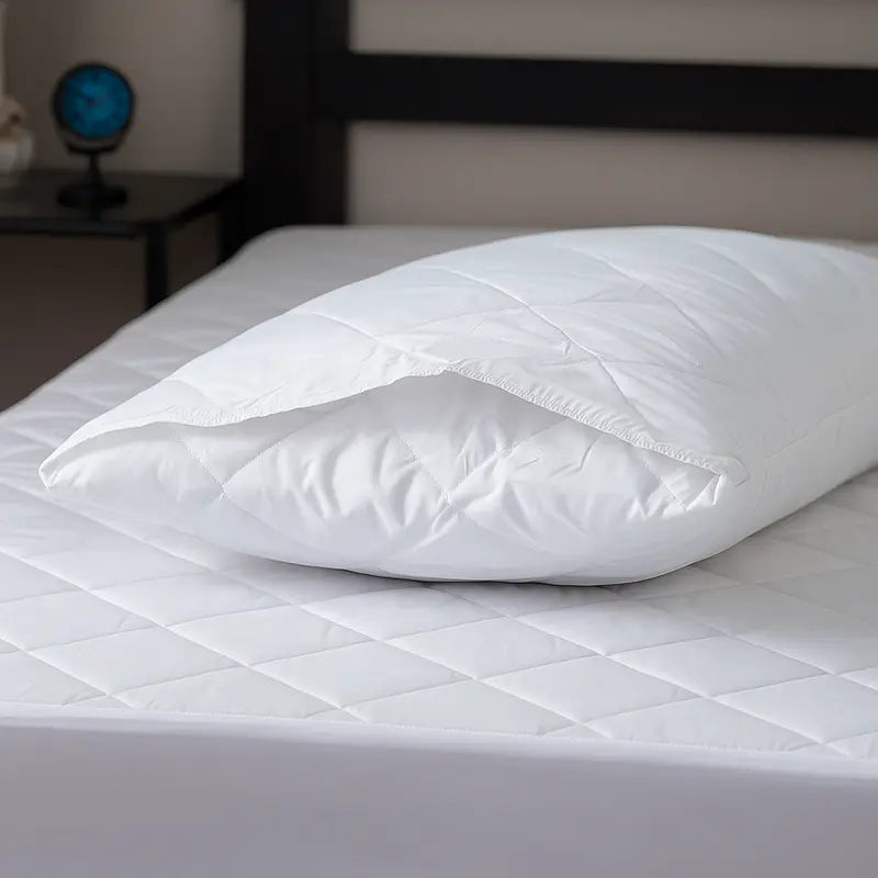 Luxury Quilted Mattress Protector Extra Deep Fitted Breathable Mattress demonstrating its extra deep elasticated fitted skirt for secure fit.