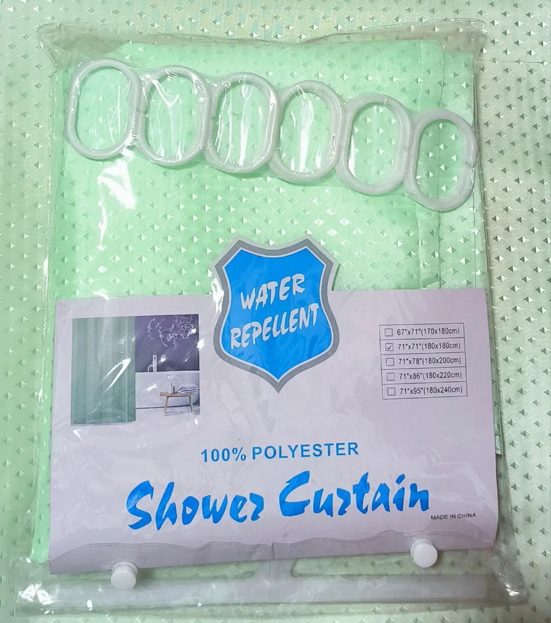 SHOWER CURTAIN WITH RINGS
